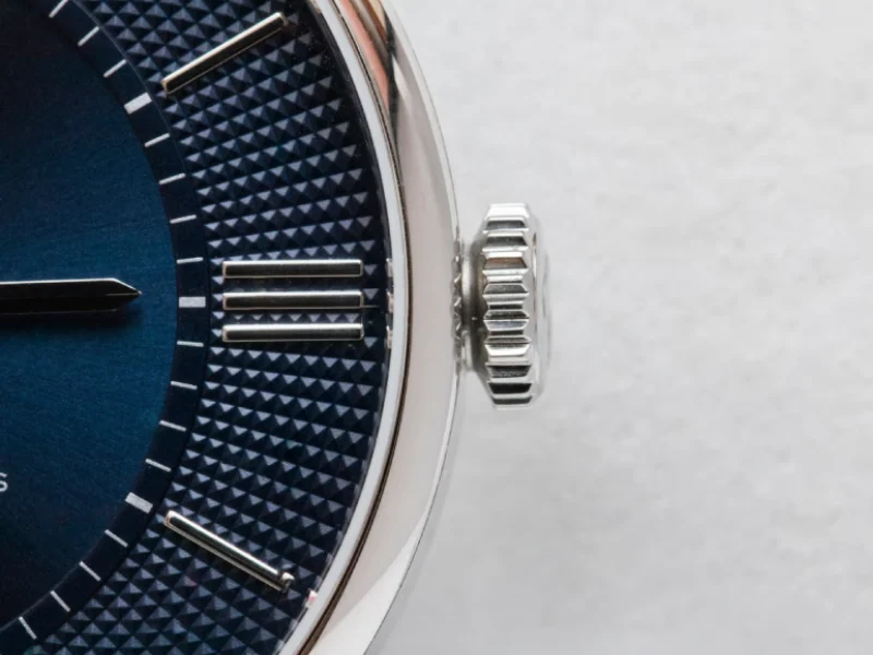 Close-up of Luxury Watch Detail with Textured Dial